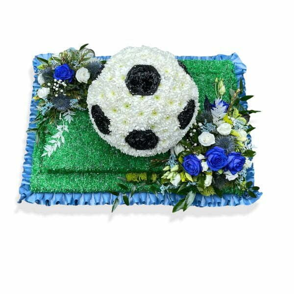 Football Tribute on pitch with roses