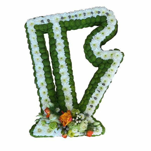 Harp funeral tribute flowers