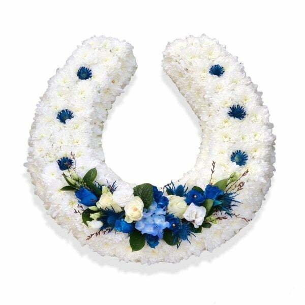 Horse shoe funeral flowers